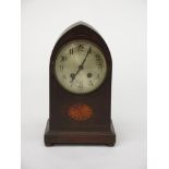 An oak and inlaid lancet shape mantel clock, 1920s,