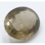 A large oval faceted topaz, 81.5 carats. Provenance: The Penrose Estate, Porthleven, Cornwall.