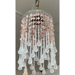 A contemporary glass chandelier, with pear shape drops, height 30cm.