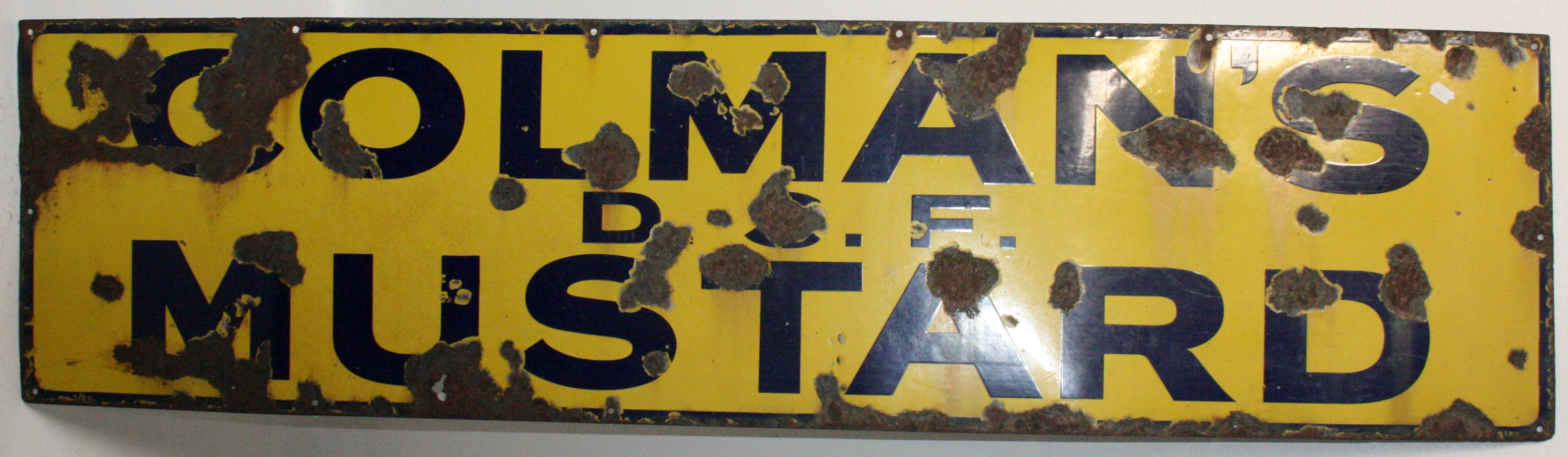 An enamel advertising sign 'Colman's Mustard', in blue on a yellow ground, 40.5 x 157cm.