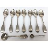 A set of six silver fiddle pattern teaspoons each engraved with a script EMT, London 1859,