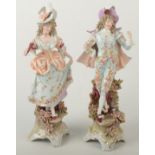 A pair of Ernst Bohne and Sohne porcelain figures of a gallant and his companion,