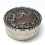 A Japanese silver circular box, Meiji Period, inlaid with gold,