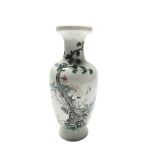A Chinese famille rose porcelain vase, with a flowering tree and cranes, Qianlong red seal mark,