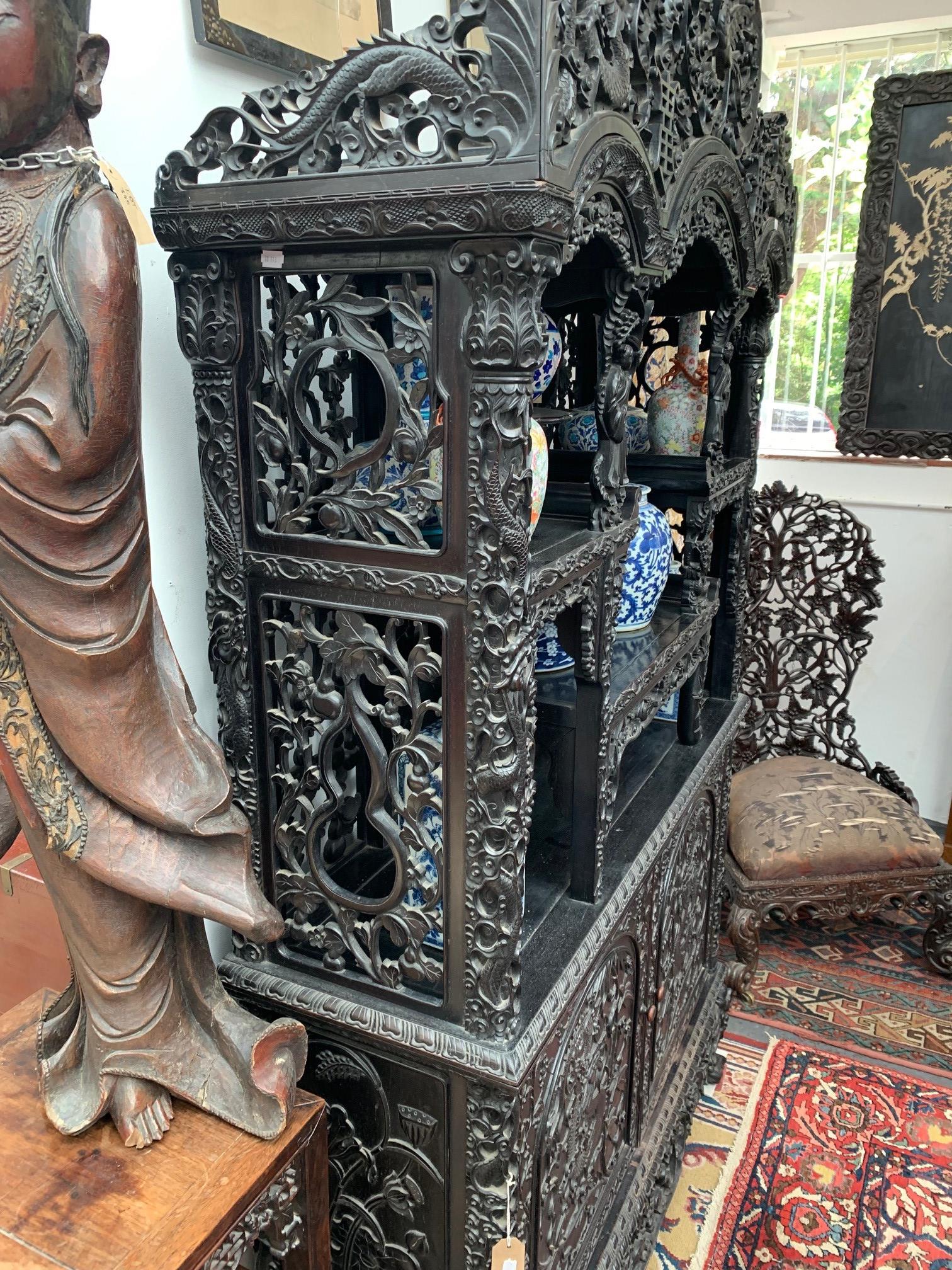 A Chinese carved ebonised display cabinet, 19th century, - Image 20 of 21