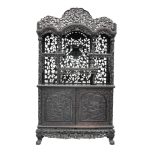 A Chinese carved ebonised display cabinet, 19th century,