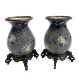 A pair of Chinese pottery baluster vases, late 19th century, with cloisonne style decoration,