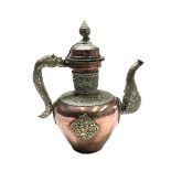 A Tibetan copper and white metal ewer, 19th century, height 35cm, width 29cm.