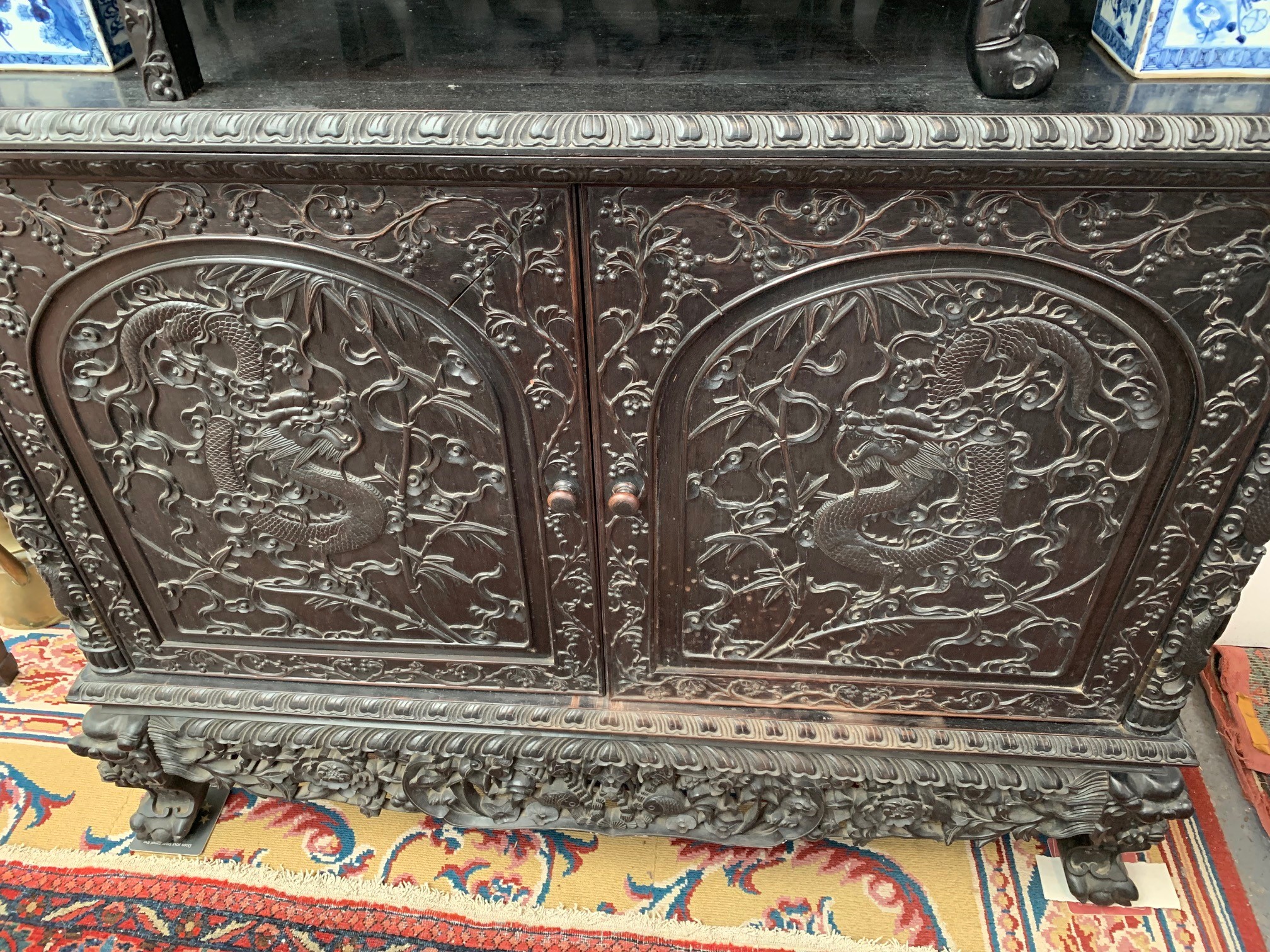 A Chinese carved ebonised display cabinet, 19th century, - Image 16 of 21