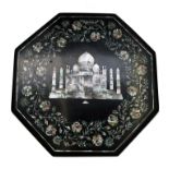 An Indian decorative inlaid black slate table top, 19th century, of octagonal form,