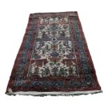 A Hamadan rug, North West Persia, the ivory field with leafy vines, flowerheads and guls,