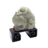 A Chinese jade carving of an elephant and three boys, 19th century,
