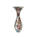 A large Japanese porcelain floor vase, with fluted everted rim and baluster shaped body,