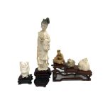 A Japanese ivory okimono of a geisha girl on stand, circa 1920, height 19cm, three netsukes,