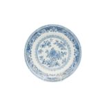 A Chinese blue and white porcelain dish, 18th century, the centre with floral sprays, 32cm diameter,