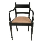 An Anglo Indian ebony armchair, early 19th century, in Regency design,