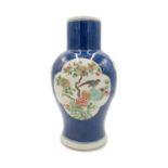 A Chinese famille verte powder blue ground porcelain baluster vase, 19th century,