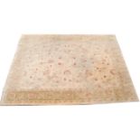 A Ziegler carpet, the ivory field with an all over design of flowering vines and palmettes,