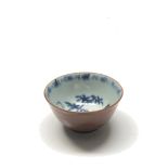 A Chinese porcelain tea bowl, with cafe-au-lait glazing to the outside,