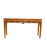 A large Chinese hardwood altar table, the frieze carved with dragon masks and foliage, height 107cm,