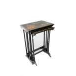 A black japanned and lacquered nest of three tables, early 20th century,