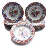 Seventeen similar Chinese porcelain plates, 18th century,