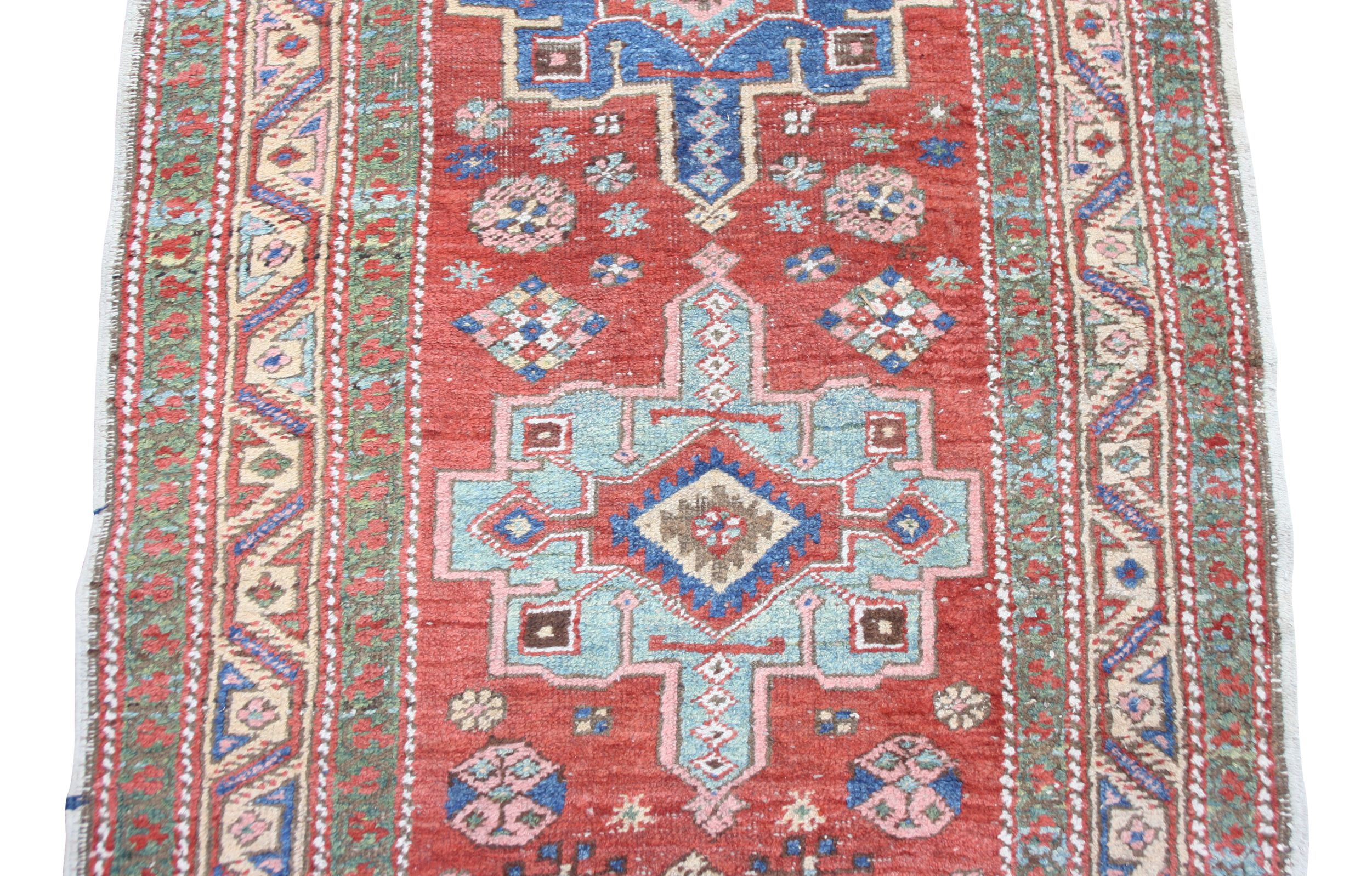 A Heriz runner, North West Persia, the madder field with seven indigo and pale blue medallions, - Image 4 of 10