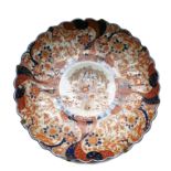 A Japanese Imari porcelain charger of large proportions, circa 1880,