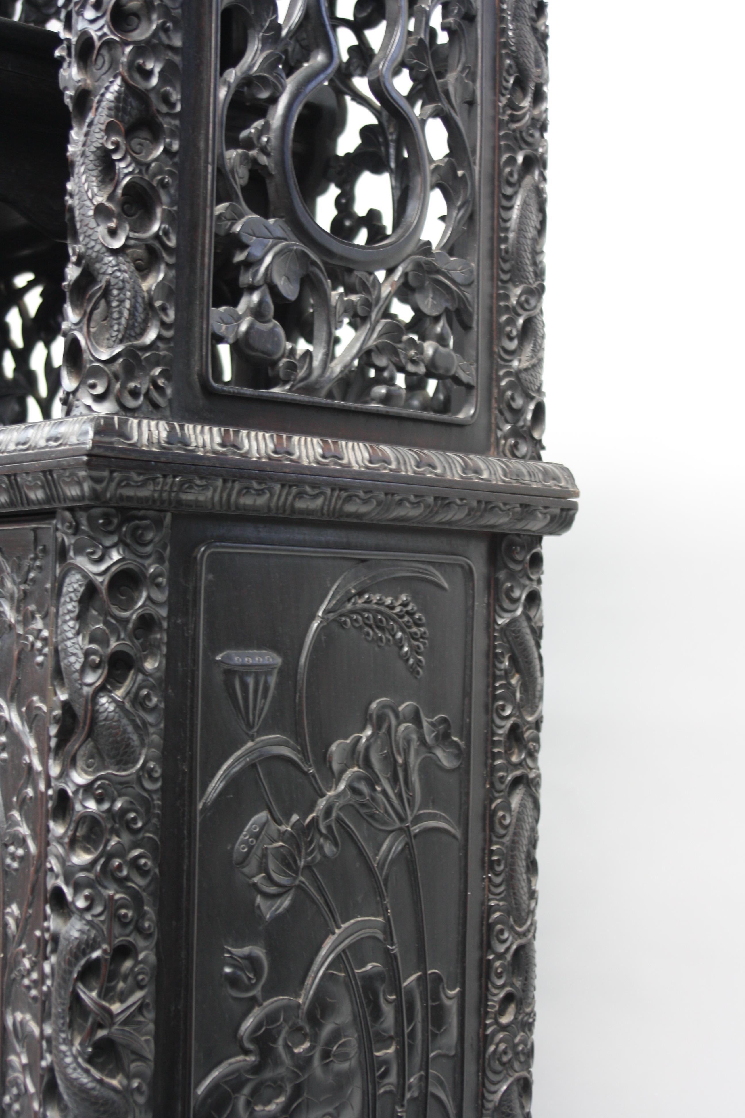 A Chinese carved ebonised display cabinet, 19th century, - Image 3 of 21