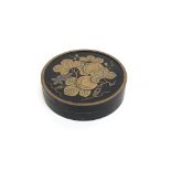 A Japanese circular box and cover, Meiji Period, with fruit decoration, signed, diameter 7cm.