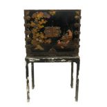 A Japanese black and gold lacquer cabinet, Edo Period, late 17th century,