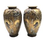 A pair of Japanese satsuma 'Thousand Faces' vases, 19th century, with applied dragons,