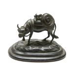 A Japanese bronze model of an ox, late 19th century, height 13cm, width 19cm.