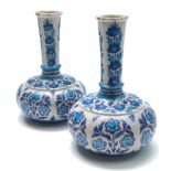 A pair of Sind pottery bottle vases, India, 19th century, of squat form,