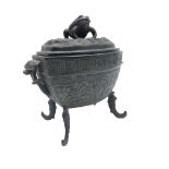 A Chinese bronze censer of archaic form, 20th century, the cover mounted with a figure of a toad,
