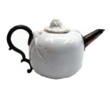 A Chinese blanc de chine teapot, Kangxi, of pomegranate shape,