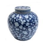 A Chinese blue and white prunus blossom pattern ginger jar and cover, late 19th century,