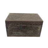 A Chinese carved wood work box, 19th century, profusely carved with figures on bridges,