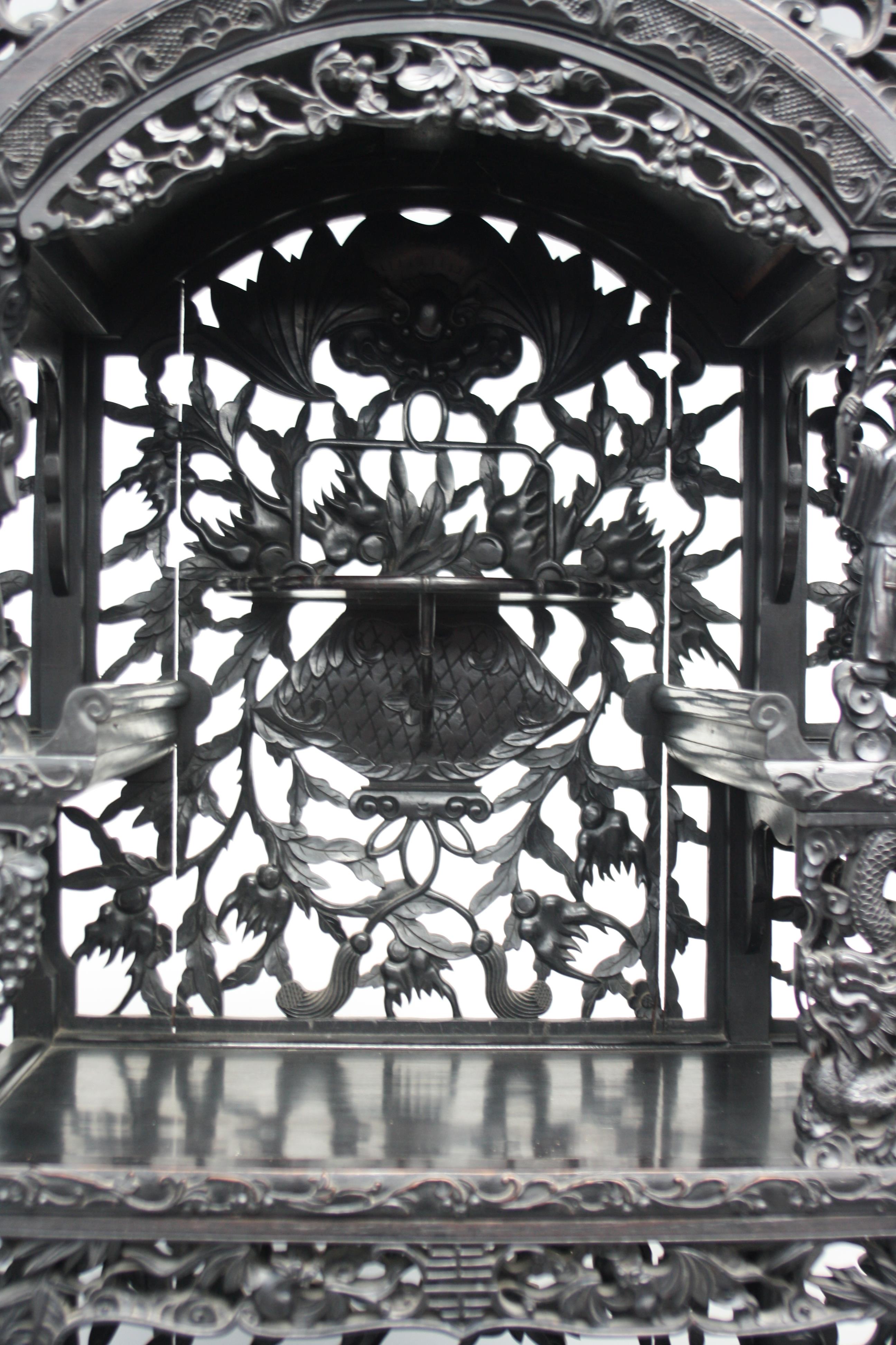 A Chinese carved ebonised display cabinet, 19th century, - Image 7 of 21