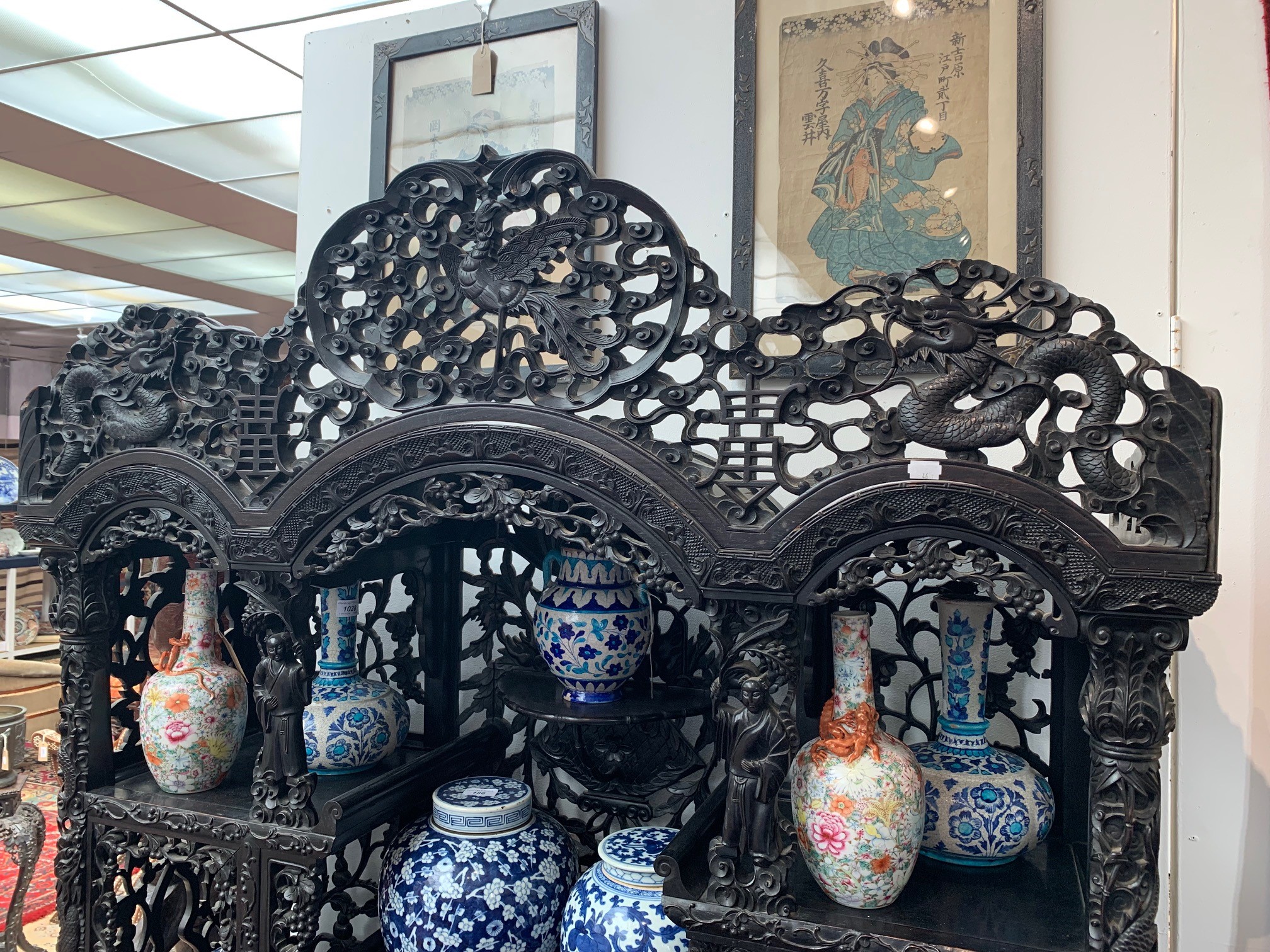 A Chinese carved ebonised display cabinet, 19th century, - Image 17 of 21