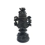 A Japanese bronze urn, cover and stand, Meiji Period, the cover with a snake amidst rockwork,