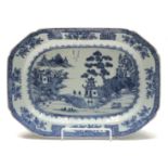 A Chinese blue and white octagonal dish, Qianlong period, the river scene with figures on a bridge,