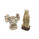 A Chinese carved soapstone figure of Shou Lao, 19th century, the immortal bearing a staff and peach,