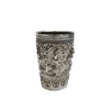 An Indian white metal beaker, height 11.5cm, diameter 8cm.