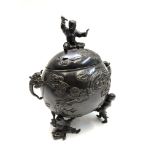 A Chinese bronze incense burner and cover, the three feet and finial modelled as boys,
