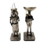 A pair of Eastern silver figural pin cushions, mark to base, height 9.5cm.