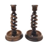 A pair of Islamic olive wood barley twist candlelsticks, early 20th century,