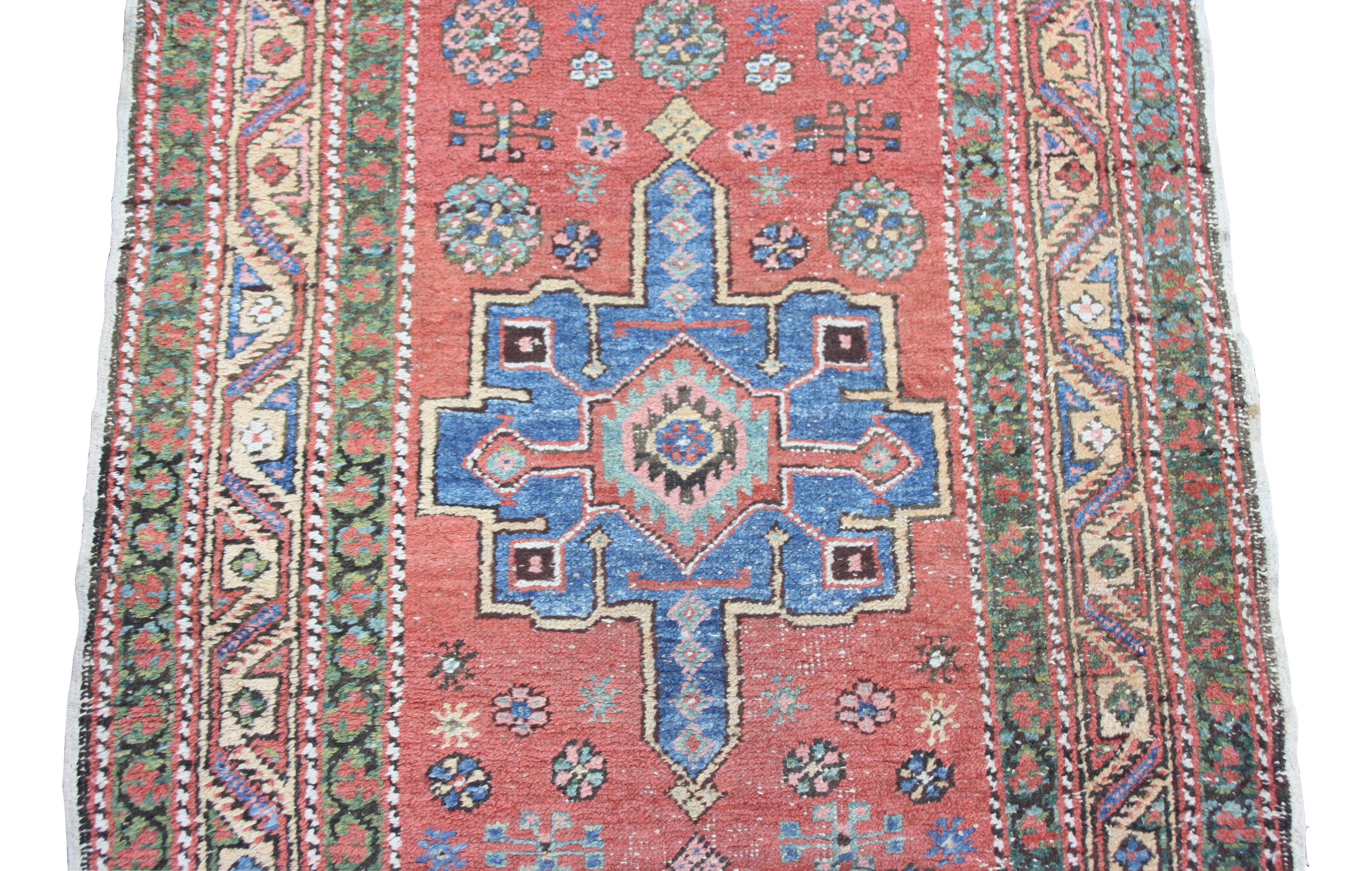 A Heriz runner, North West Persia, the madder field with seven indigo and pale blue medallions, - Image 9 of 10