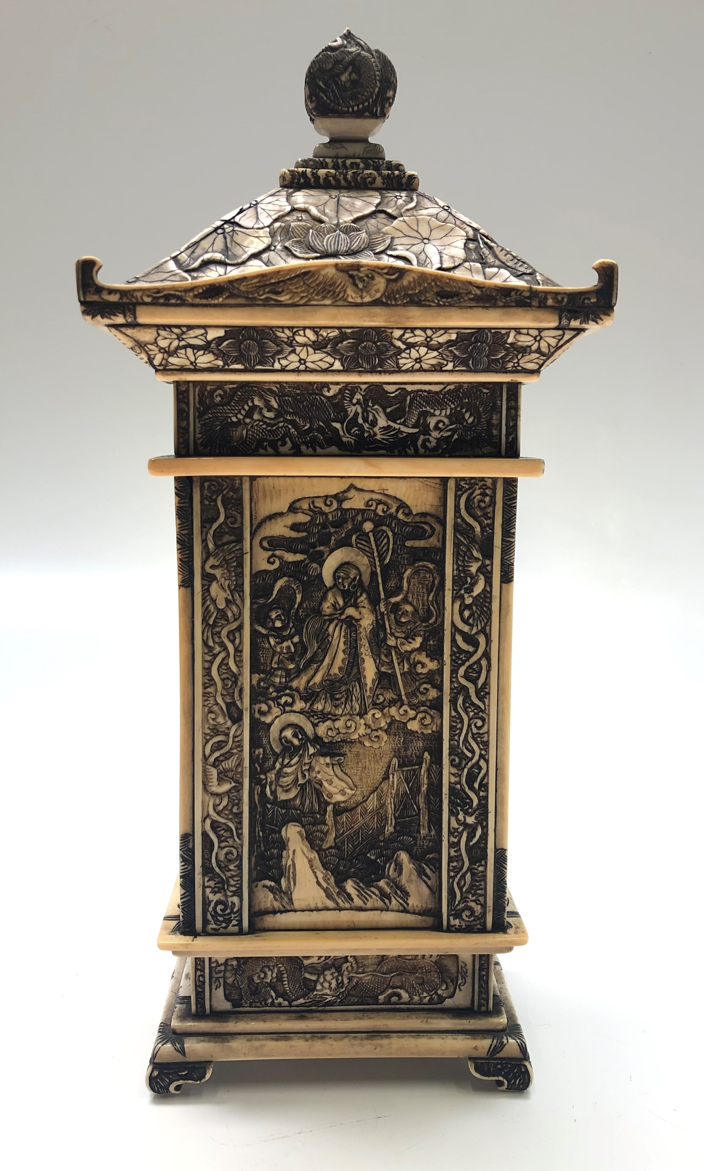 A Japanese carved ivory shrine, late Meiji period, decorated throughout with figures in landscapes, - Image 6 of 7