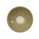 A Chinese celadon bowl, Ming Period, height 5.7cm, diameter 16cm.